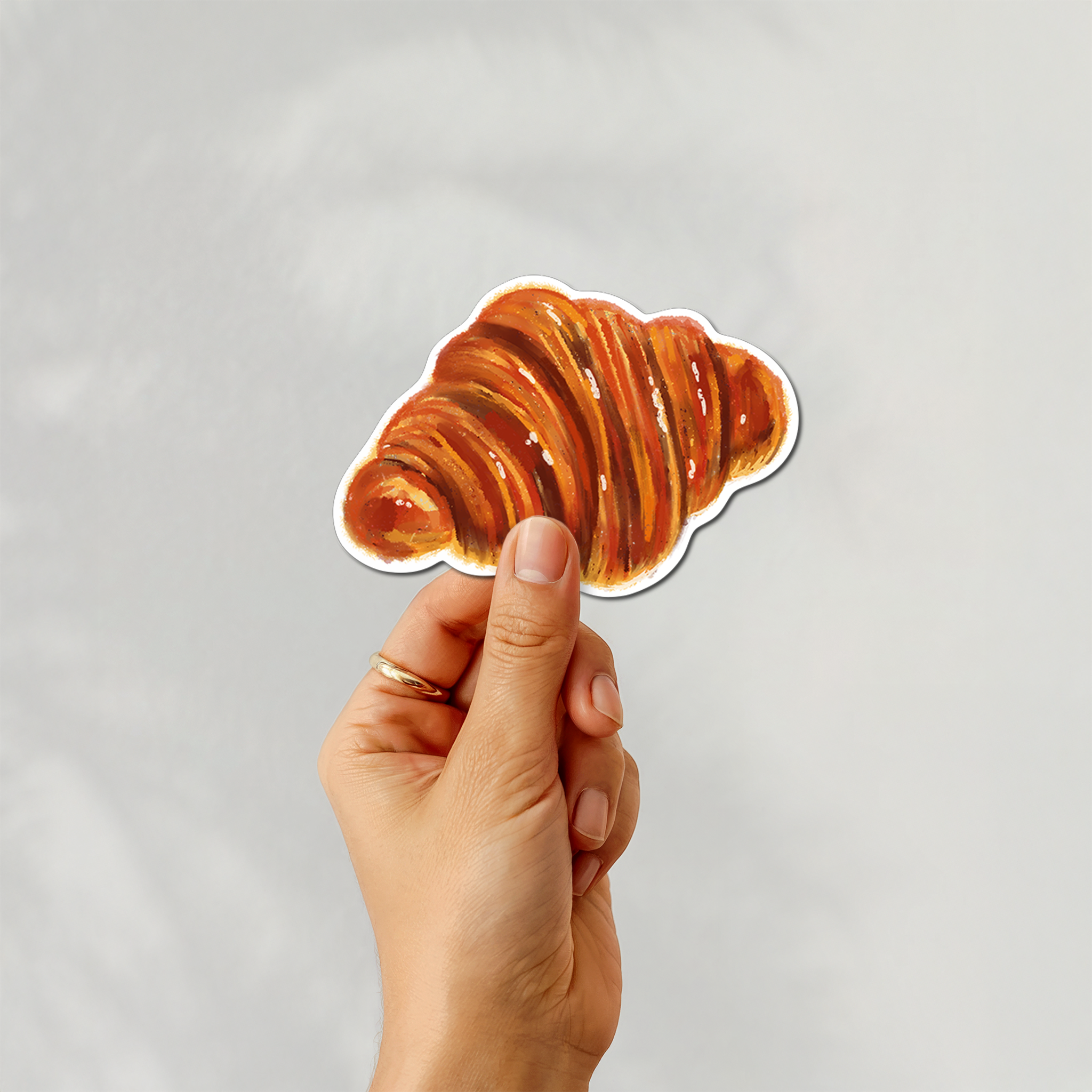 croissant-sticker-mockup.png